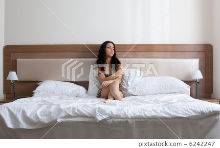 Sexy young woman in bedroom Sexy young woman in bedroom 6242247