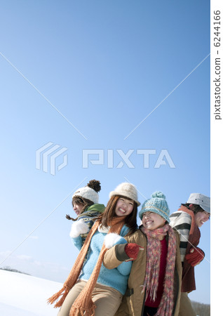 Young people playing a serious vampire on the snowy field 6244166