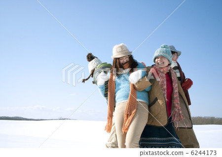 Young people playing a serious vampire on the snowy field 6244173