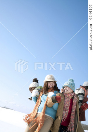 Young people playing a serious vampire on the snowy field 6244195