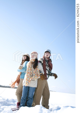 Young people playing a serious vampire on the snowy field 6244253