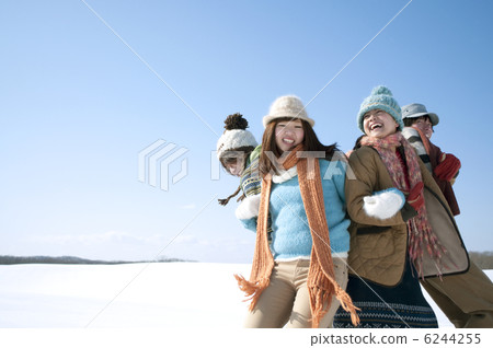 Young people playing a serious vampire on the snowy field 6244255