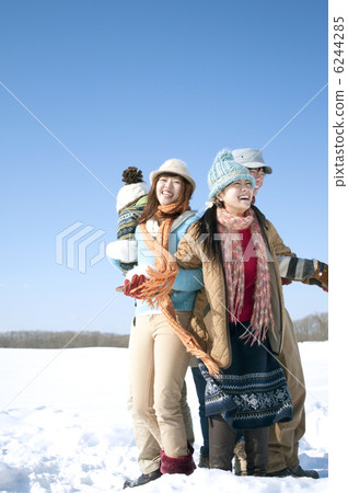 Young people playing a serious vampire on the snowy field 6244285