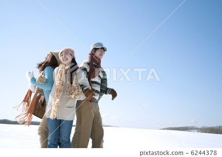Young people playing a serious vampire on the snowy field 6244378