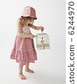 Cage basket and girl 6244970