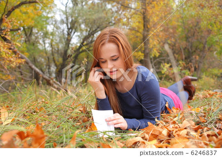 beautiful girl holding an open book beautiful girl holding an open book 6246837