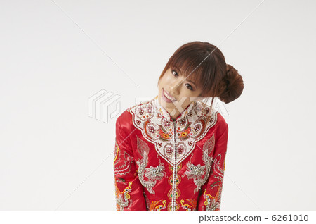 A young lady in a Chinese dress A young lady in a Chinese dress 6261010
