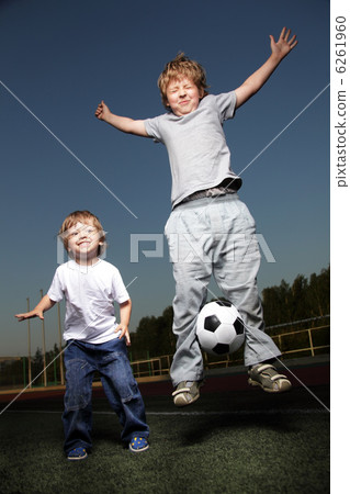 two happy boys play in soccer  6261960
