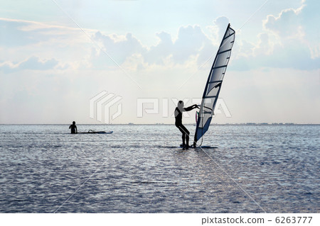 Silhouette of a windsurfer Silhouette of a windsurfer 6263777
