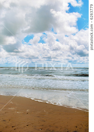Cloudy sky over the stormy sea Cloudy sky over the stormy sea 6263779