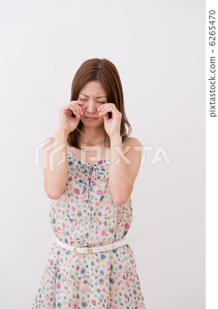 A woman in a cami dress 6265470