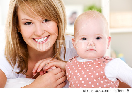 Smiling mother with newborn baby Smiling mother with newborn baby 6266639