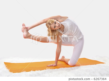 Young beautiful girl is professionally engaged in yoga 6267364