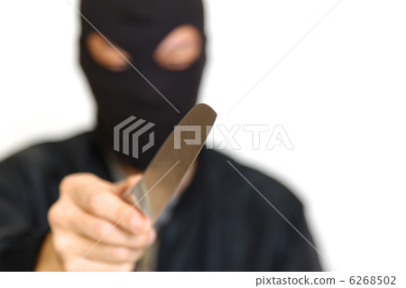 A man on a mask with a knife A man on a mask with a knife 6268502