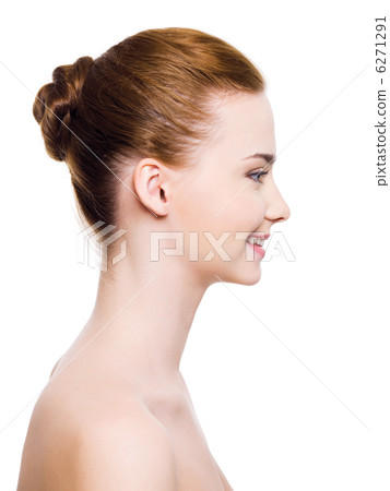Smiling woman face with clear skin 6271291