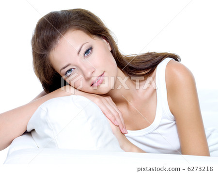 beautiful woman with clean skin sitting on sofa 6273218