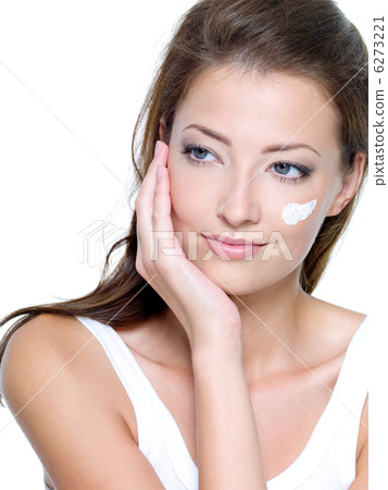 moisturizer cosmetic cream on female face moisturizer cosmetic cream on female face 6273221