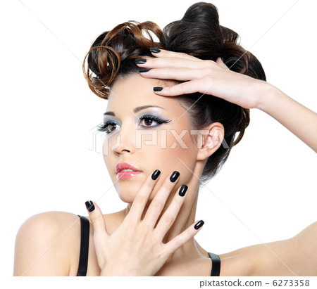Woman with stylish hairstyle and black nails 6273358