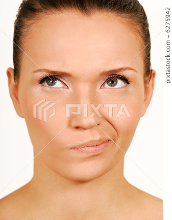 Making a Face. Distrust girl face. 6275942