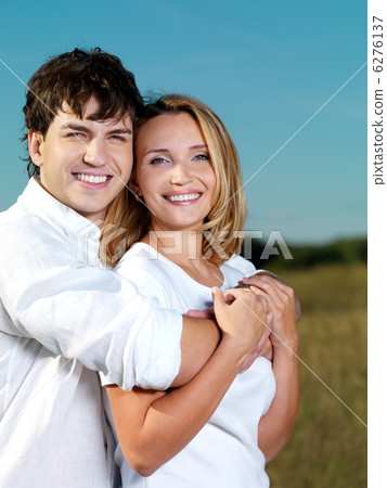 happy beautiful couple on nature happy beautiful couple on nature 6276137
