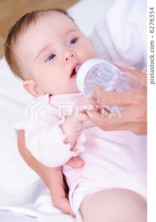 Baby with plastic bottle Baby with plastic bottle 6276354