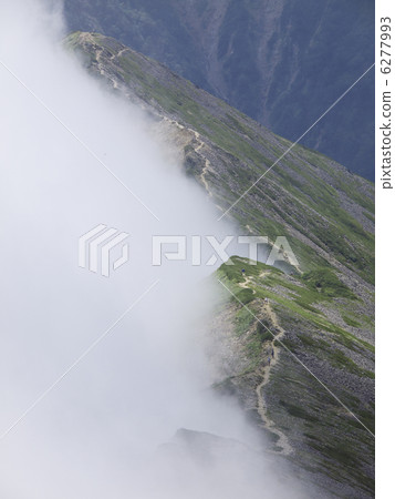 Mist and mountain trails Mist and mountain trails 6277993