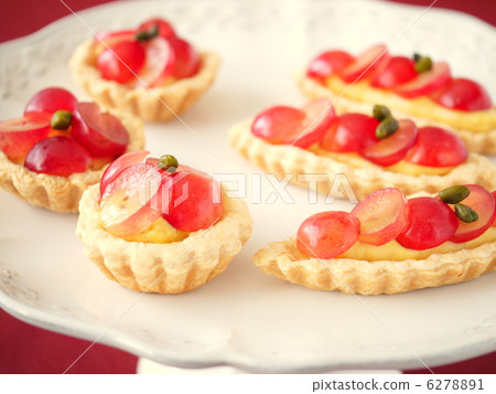 Grape tartlet serve with cake stand 6278891
