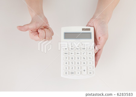 Calculator and hand 6283583