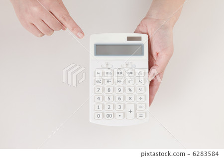 Calculator and hand Calculator and hand 6283584