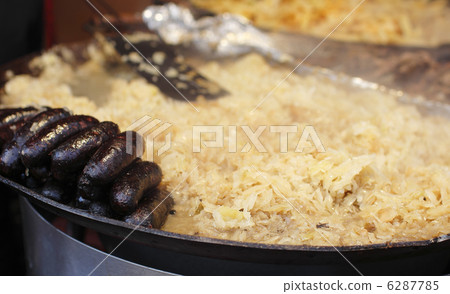 sausage and cabbage roasted on a street fair 6287785