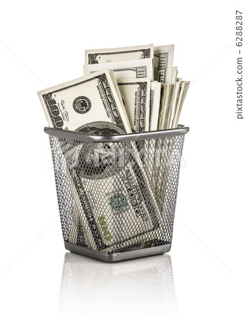 Money in a basket on a white background 6288287