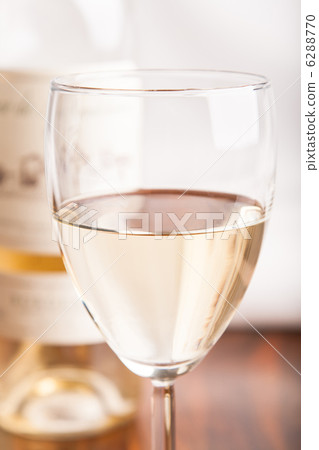 glass and bottle white wine 6288770