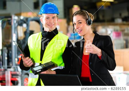 Coworkers at warehouse of forwarding company 6289155