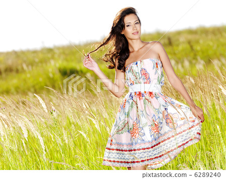 Young beautiful smiling woman outdoors Young beautiful smiling woman outdoors 6289240