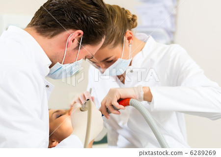 Patient with Dentist - dental treatment 6289269