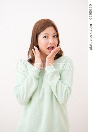 A woman in a green knit 6290639