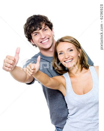 smiling people with thumbs-up gesture smiling people with thumbs-up gesture 6296928