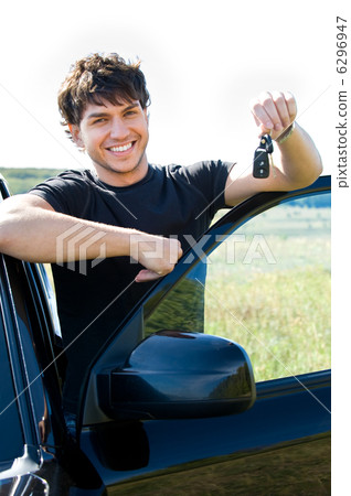happy man showing keys near the car happy man showing keys near the car 6296947