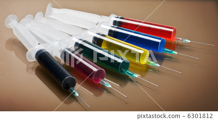 Plastic syringes with colored liquid Plastic syringes with colored liquid 6301812