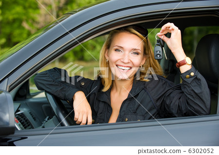 woman shows keys from the car woman shows keys from the car 6302052