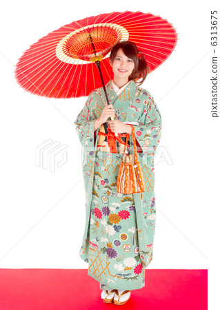 A cute woman with a smile with a snake's umbrella wearing a sleeve A cute woman with a smile with a snake's umbrella wearing a sleeve 6313675