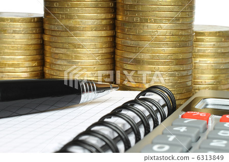Stationery with stack of coins . Stationery with stack of coins . 6313849