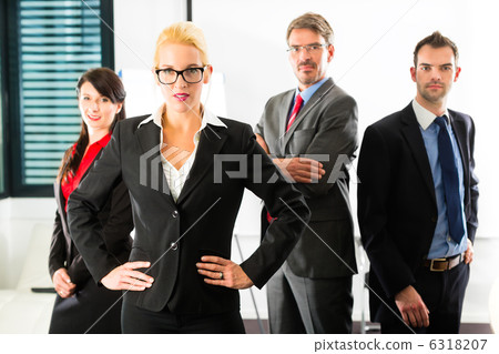 Business - group of businesspeople in office 6318207