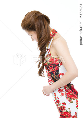A woman in a Chinese dress 6322083