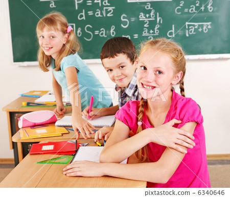 School child sitting in classroom. School child sitting in classroom. 6340646