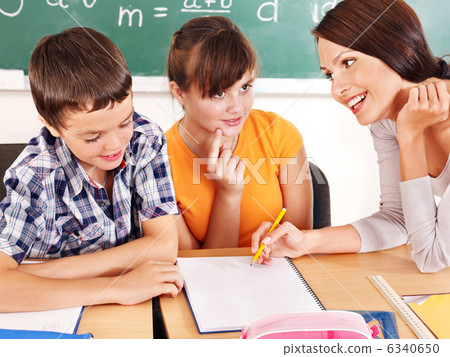 School child with teacher. School child with teacher. 6340650