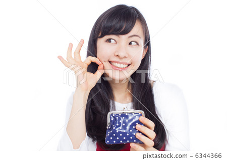 A woman holding a wallet 6344366