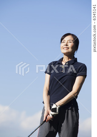 Women in golf wear 6345141