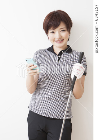 Women in golf wear 6345157