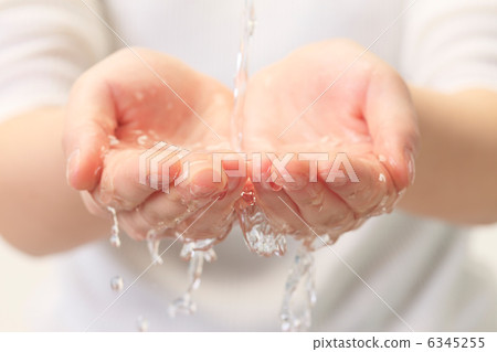 Hand and water Hand and water 6345255